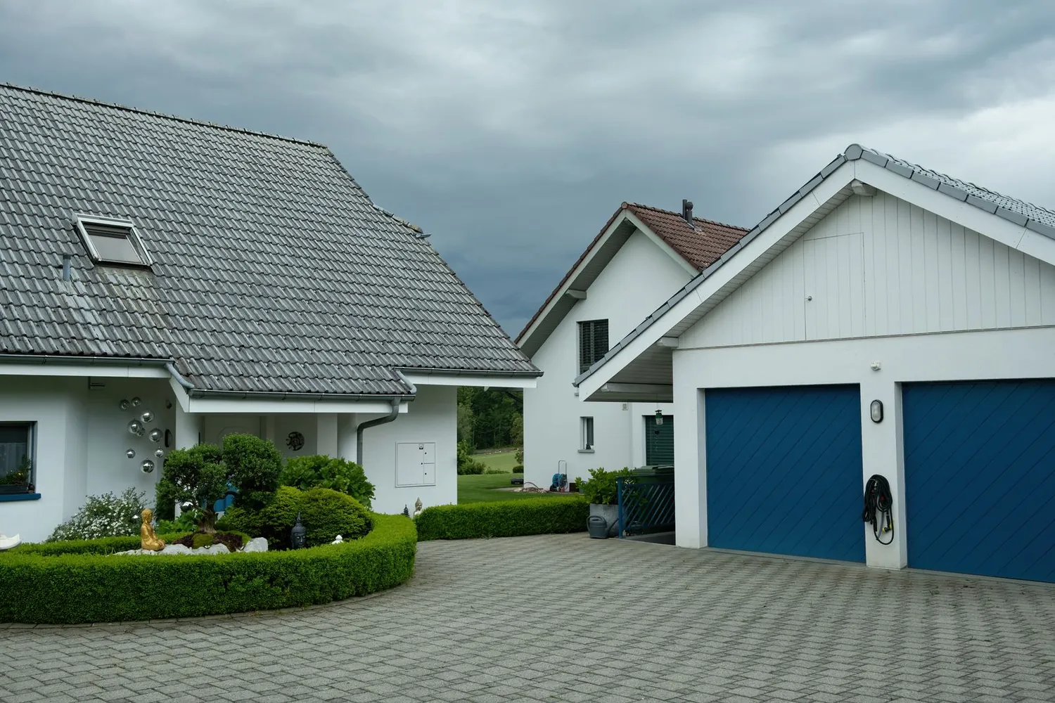 Home with clean driveway and walkway